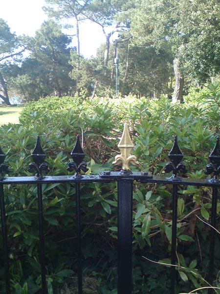 After photo of the fence freshly painted in a coat of black and gold paint to add detail Bournemouth - Frampton and Sons Bournemouth
