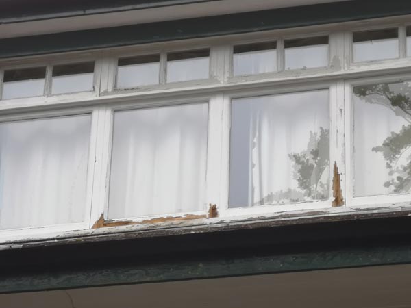 Rotten Window Painting a Block of Flats for a Management Company in Bournemouth - Before Photo - Frampton and Sons Bournemouth